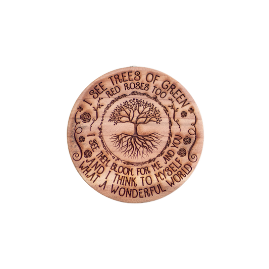 Tree of Green wooden air freshener by FlowerWood featuring an engraved Tree of Life and the lyrics ‘I see trees of green, red roses too’ from What a Wonderful World handcrafted cedar wood car freshener with natural essential oils.